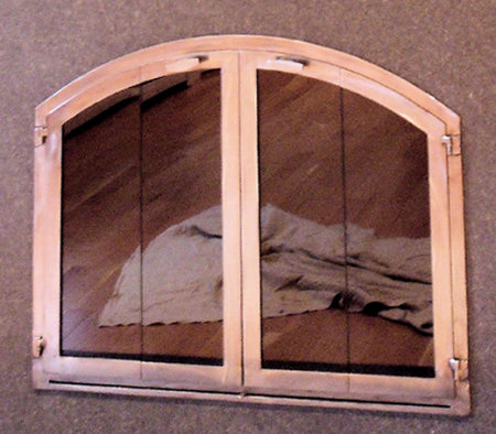 Nantucket Arch All light natural iron finish,  vice bi fold doors, , standard smoked glass, gate mesh spark screen doors, with hidden draft panel on raised firebox.